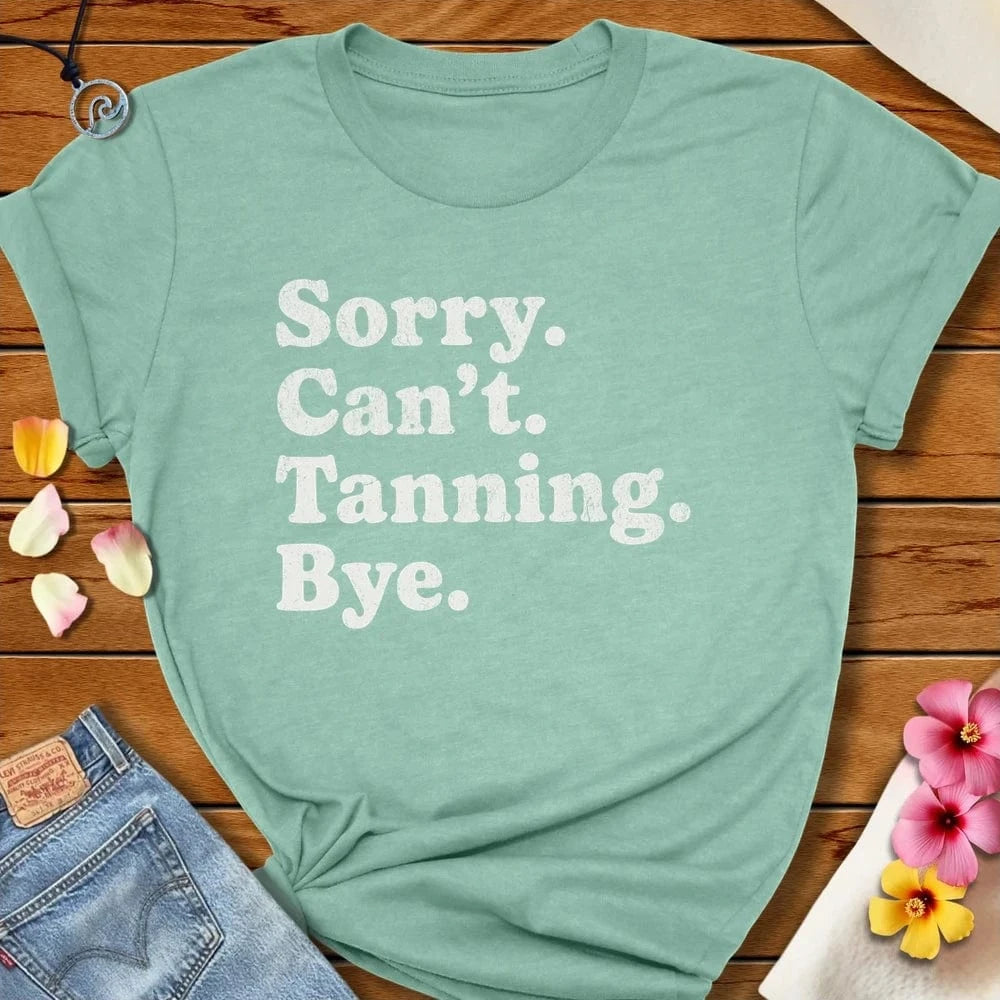 Sorry Can Tanning Bye Tee Heather Prism Dusty Blue by Salty By Choice® We love the beach ocean and anything around water.