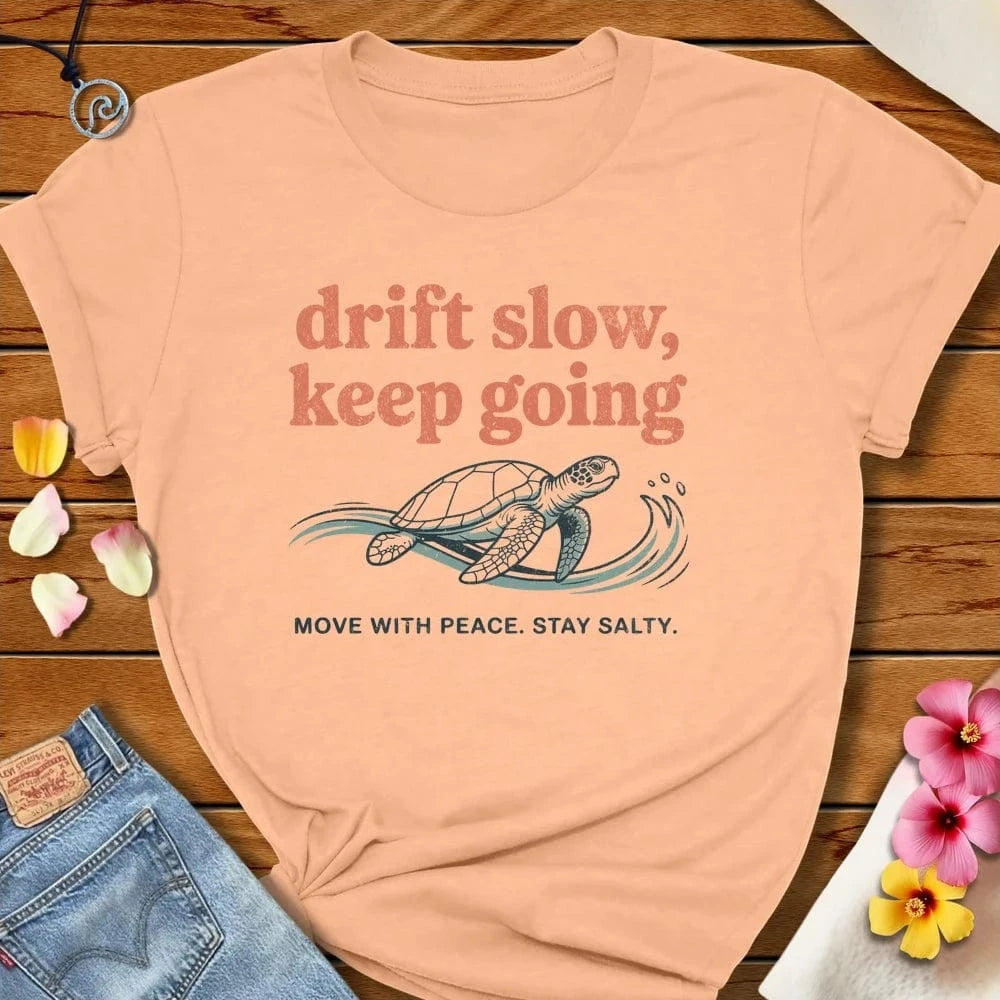 Drift Slow Tee Peach by Salty By Choice® We love the beach ocean and anything around water.