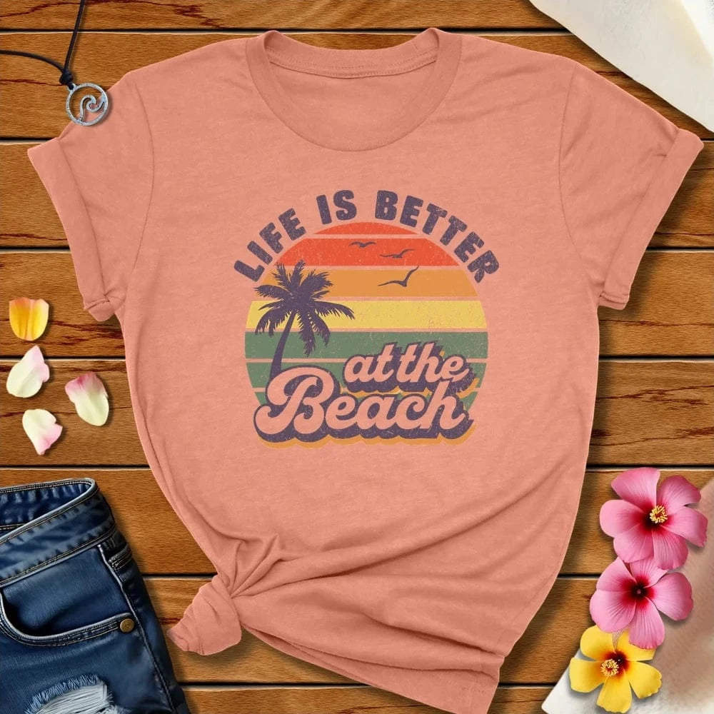 Better At The Beach Tee Heather Prism Sunset by Salty By Choice™ We love the beach ocean and anything around water.