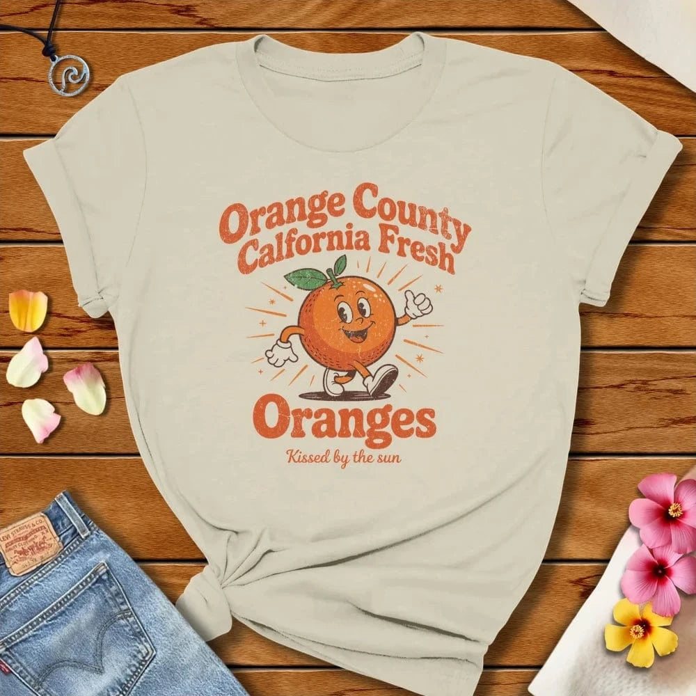 Orange County Tee Natural by Salty By Choice® We love the beach ocean and anything around water.
