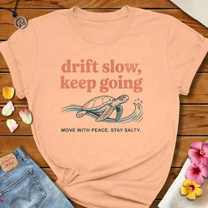 Drift Slow Tee Peach by Salty By Choice® We love the beach ocean and anything around water.